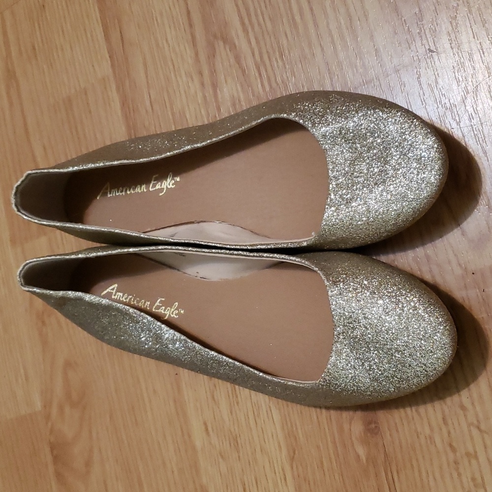 Gold glittery slip on shoes